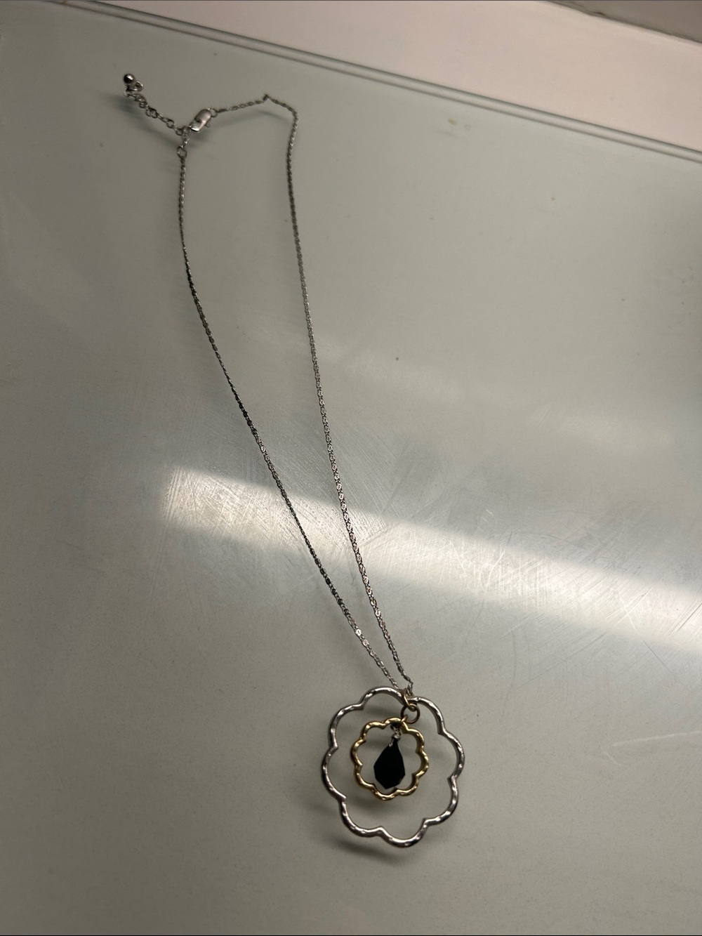 Two-Tone Floral Pendant Necklace with Black Teardrop Accent